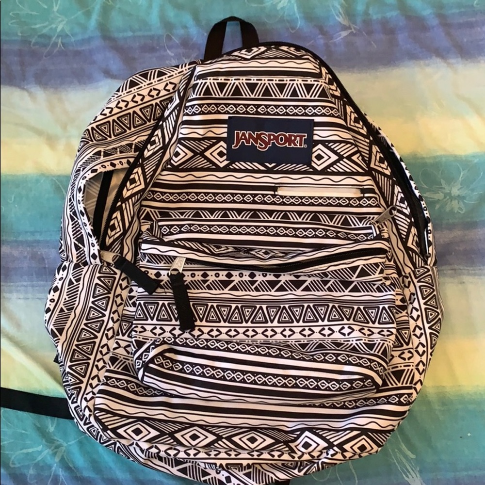 White and black Jansport backpack
